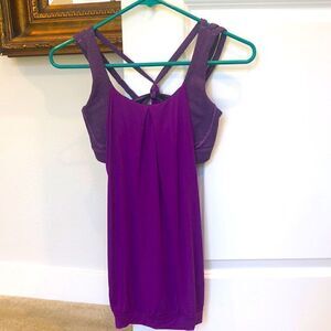 NWOT. LULULEMON purple workout top w/built in bra. Sz 4